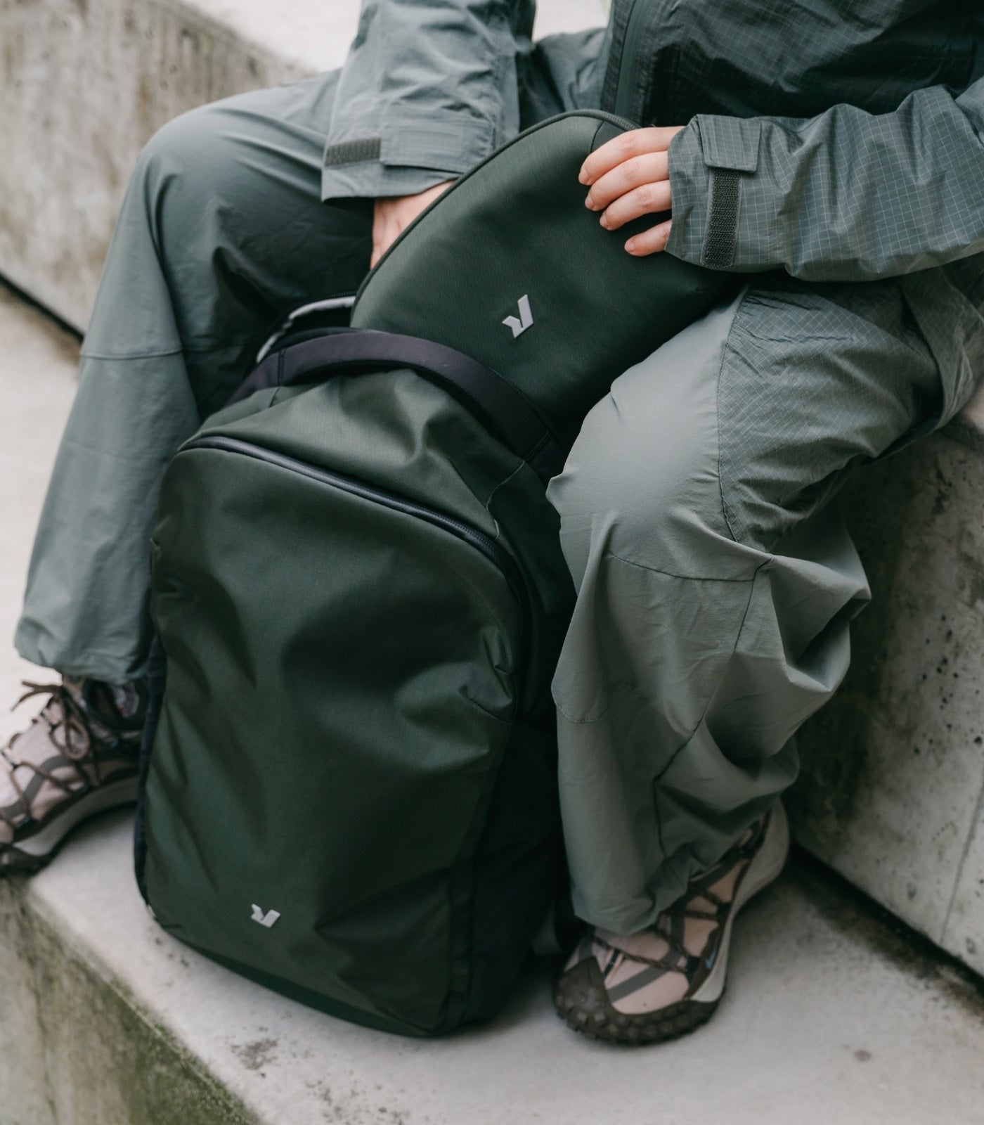 EDC Pro Backpack and Essential Tech Pouch in green by Rushfaster — carrying your full digital workflow for work, commute and travel.
